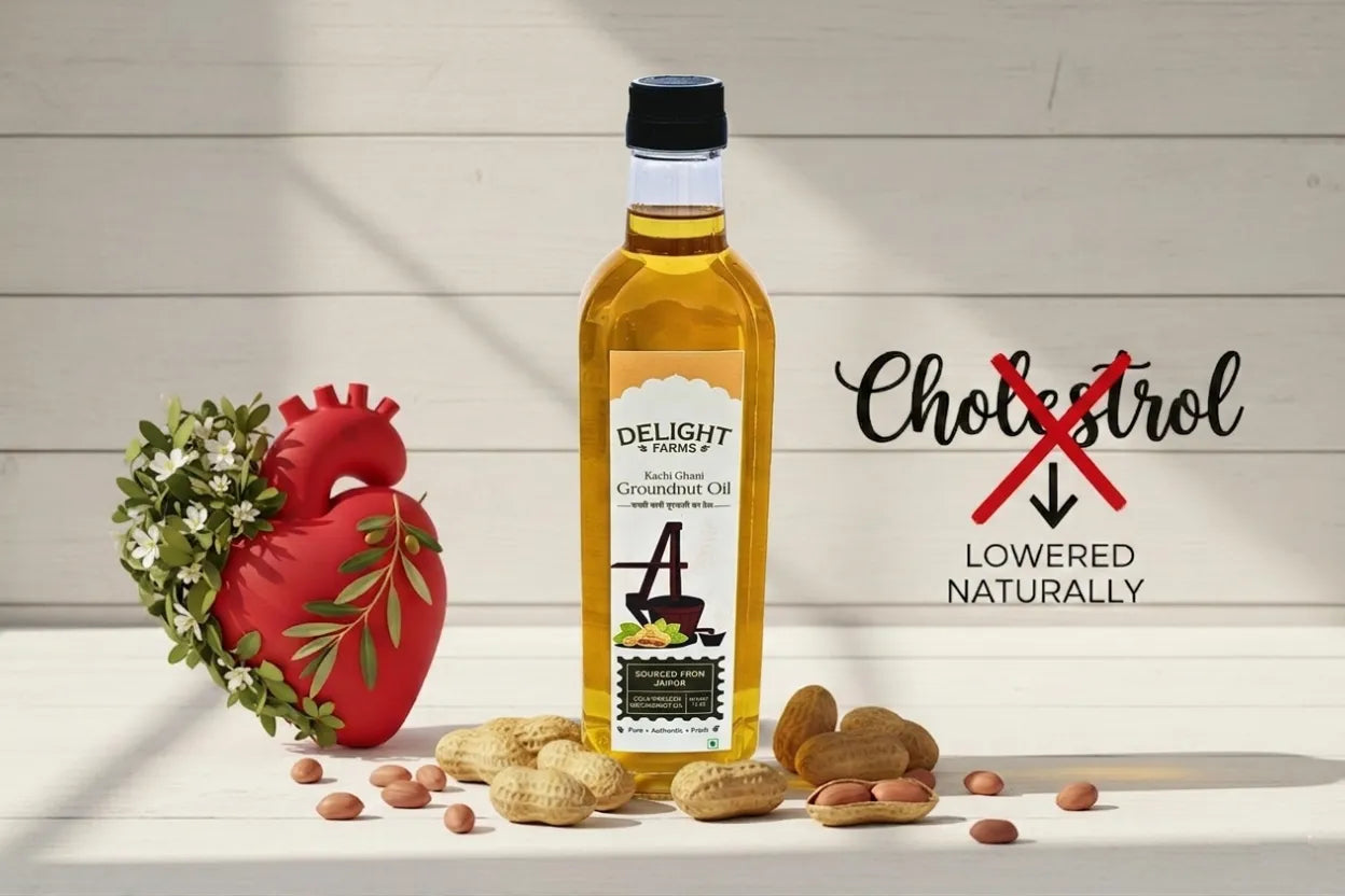 Groundnut oil bottle with peanuts and heart symbol showing cholesterol lowering benefit